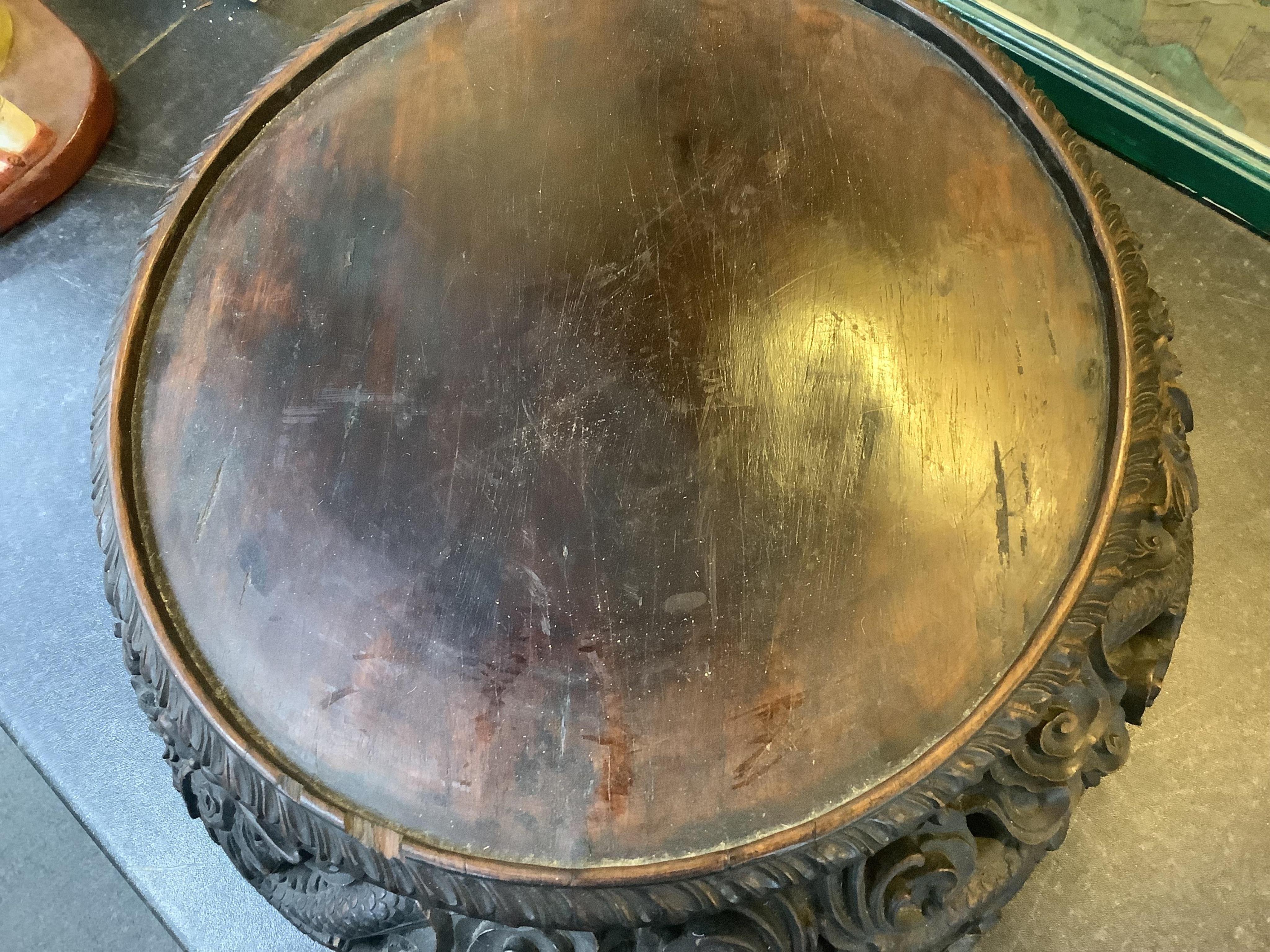 An impressive Chinese hongmu ‘dragon’ stand, late 19th century